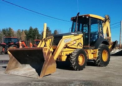 Tractopelle de marque John Deere année 2003 — photo 2