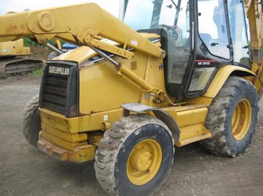 Tractopelle de marque Caterpillar année 1999 — photo 2