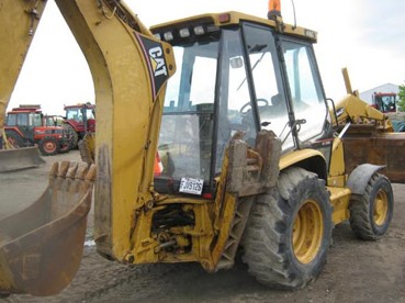 Tractopelle de marque Caterpillar année 1999 — photo 4
